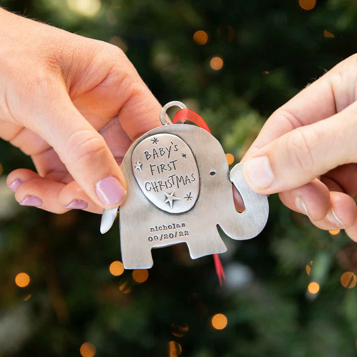phrase or date being hung on a Christmas tree