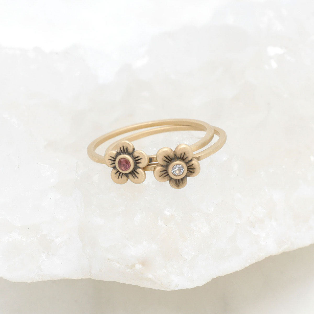 Birthstone bloom ring handcrafted in 14k yellow gold with an antiqued/satin finish set with a 2mm birthstone