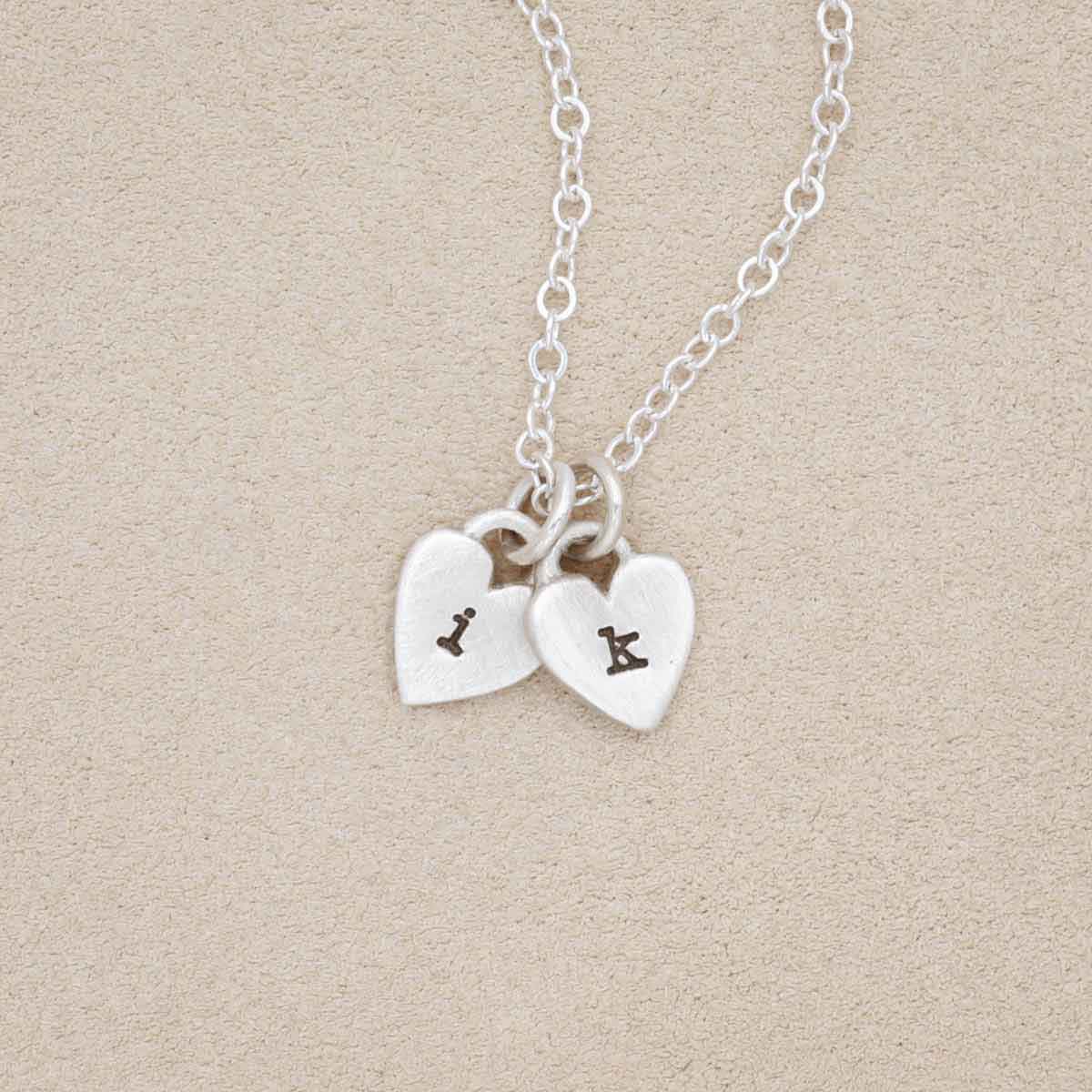 Cherished hearts initials necklace handcrafted in sterling silver including two customizable sterling silver charms