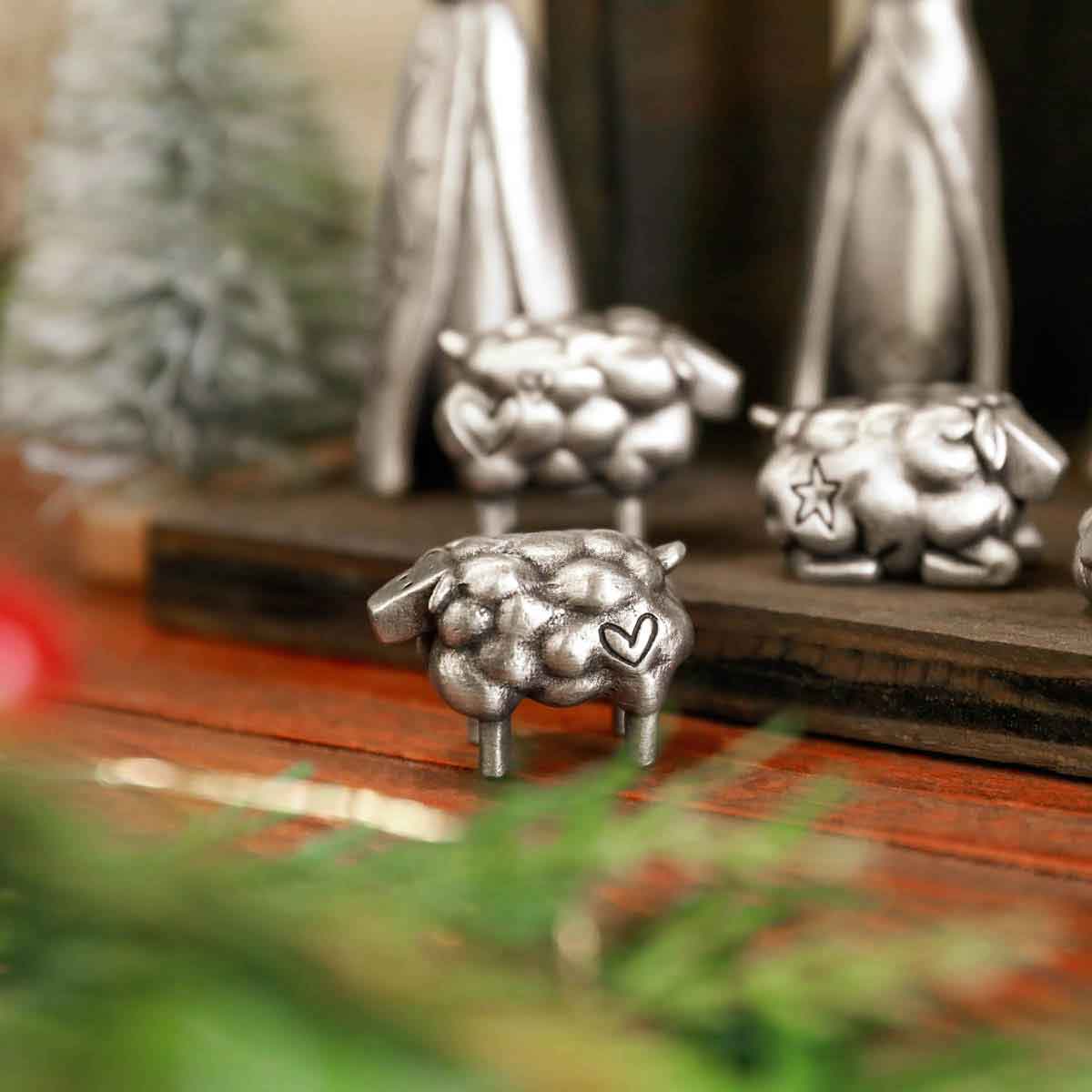 hand cast in pewter and engraved with heart and star symbols