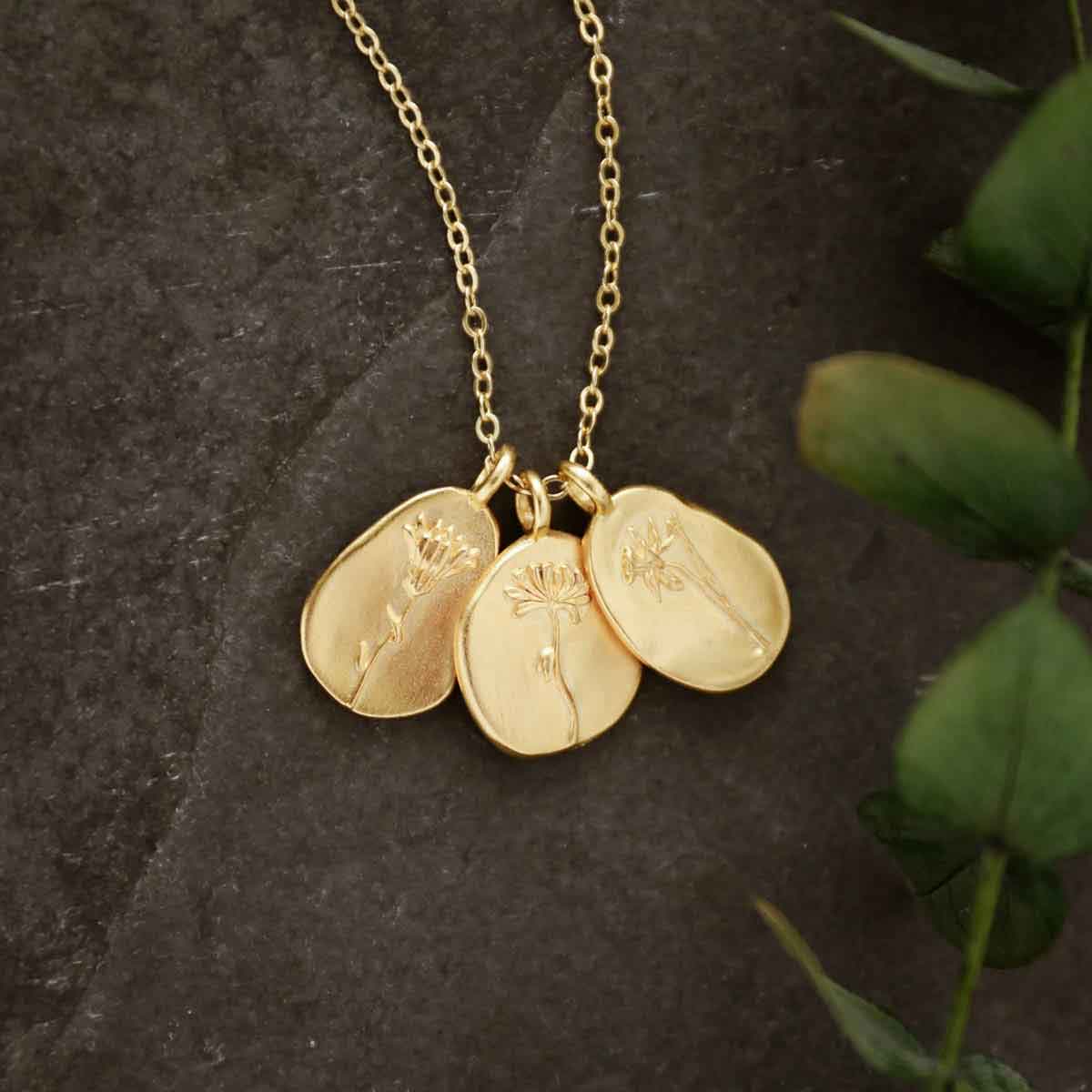 and December birth flower necklace with an 18" gold filled link chain