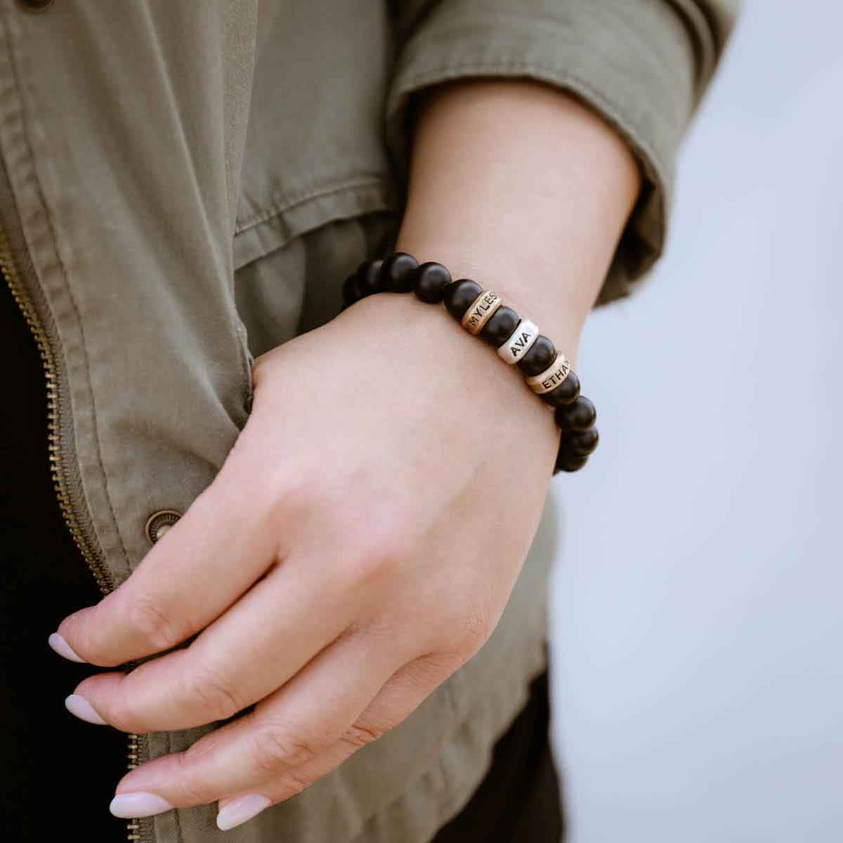 with choice of sterling silver or bronze beads that are customizable with names or dates