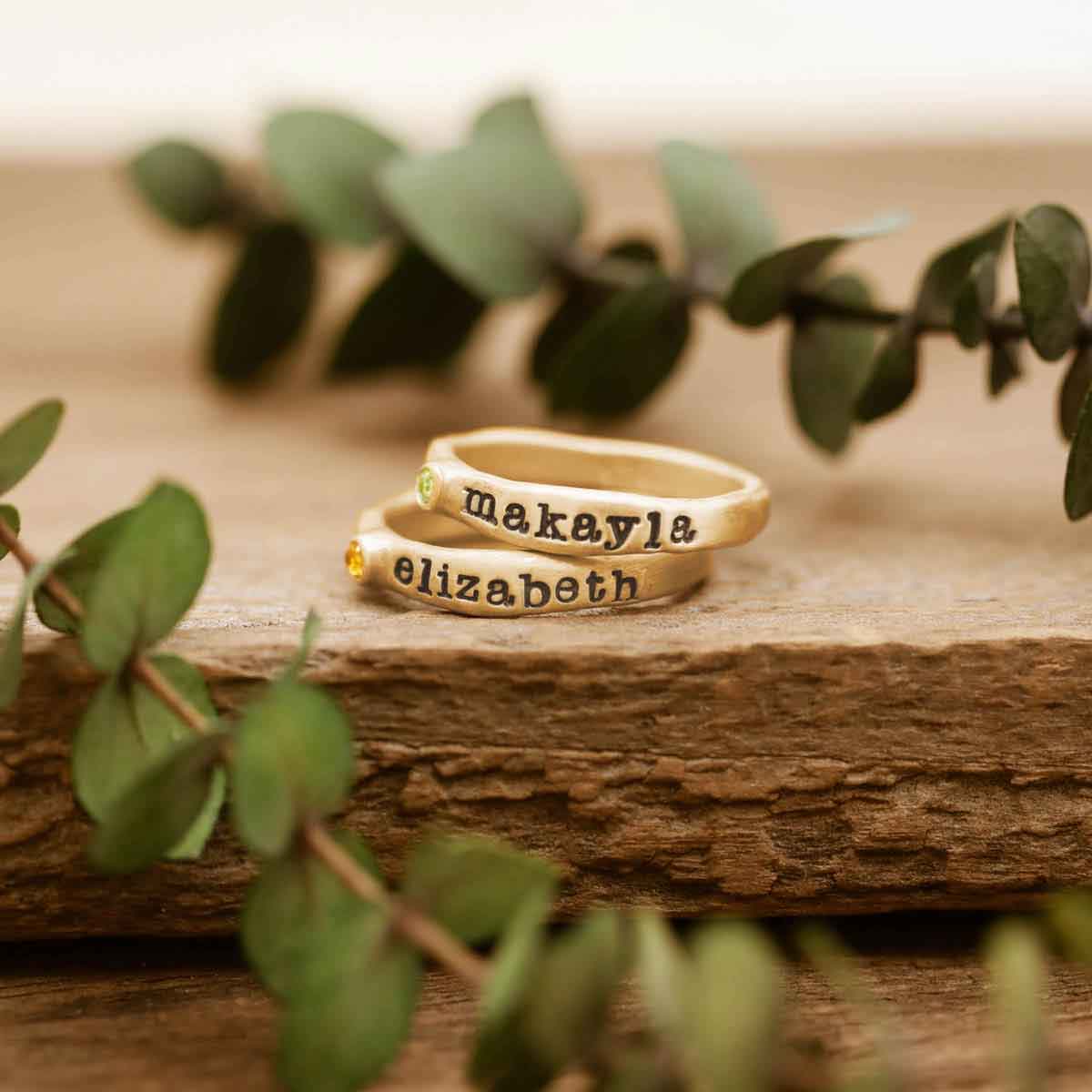 Personalized passage ring handcrafted in 14k yellow gold with your choice of birthstone