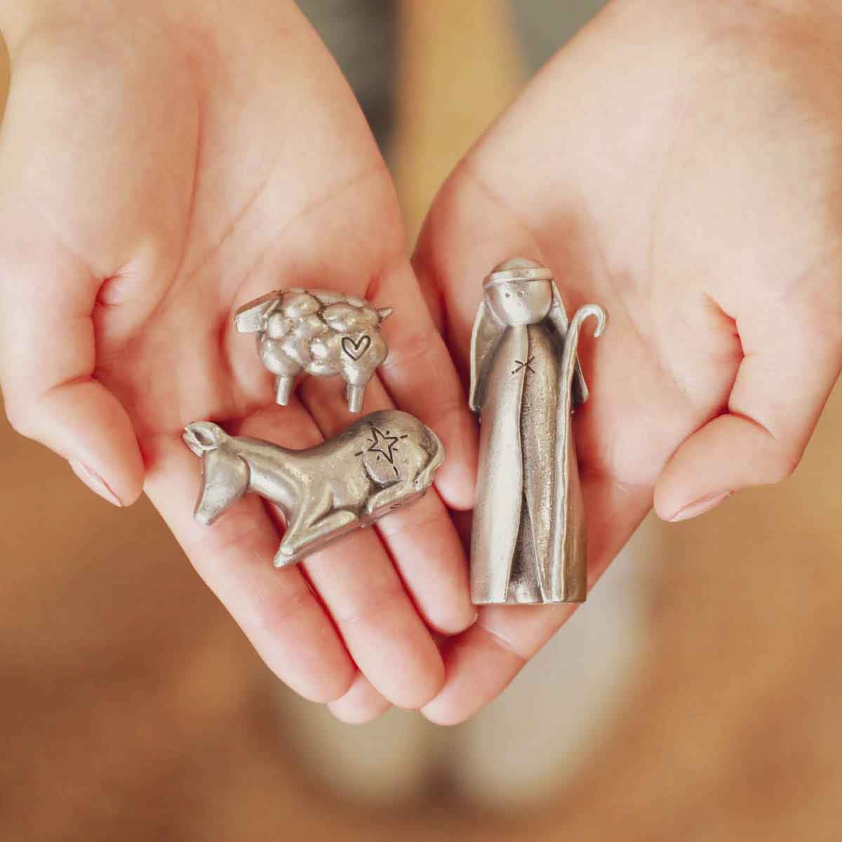 shepherd nativity figurine set hand-molded and cast in fine pewter and including a shepherd