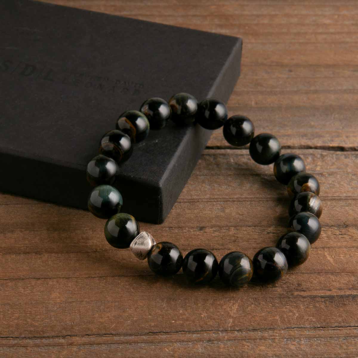 with girlfriend sitting in front of christmas tree