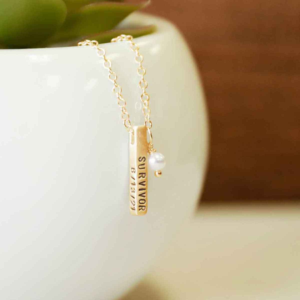 personalized up to 4 sides and handcrafted in yellow gold