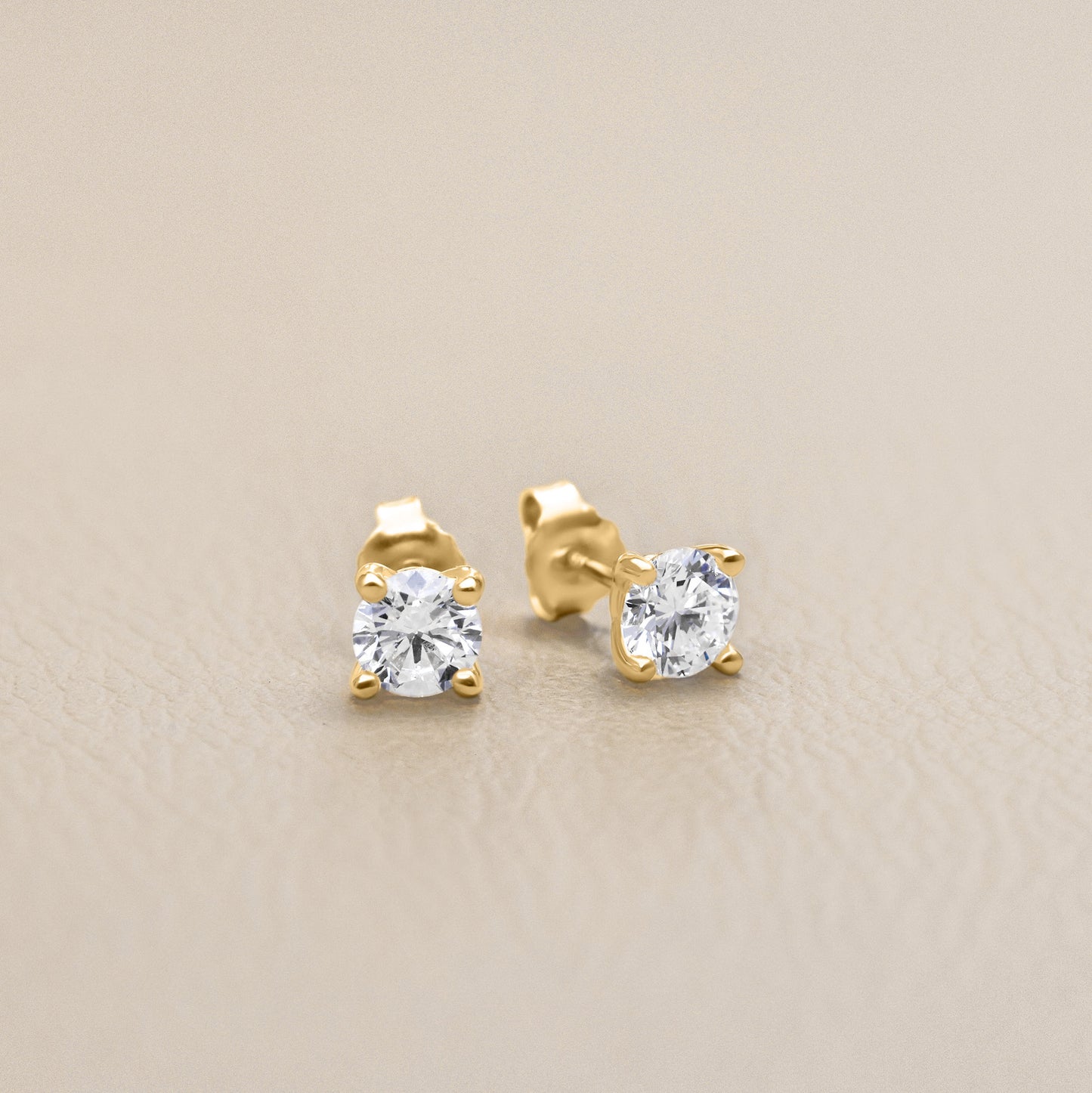 You are a Light Round Diamond Stud Earrings 1.5ct (14K Solid Gold)