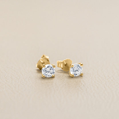 You are a Light Round Diamond Stud Earrings 0.5 ct (14K Solid Gold)