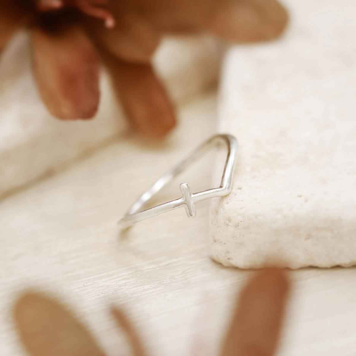 woman wearing a sterling silver At Every Turn Cross Ring