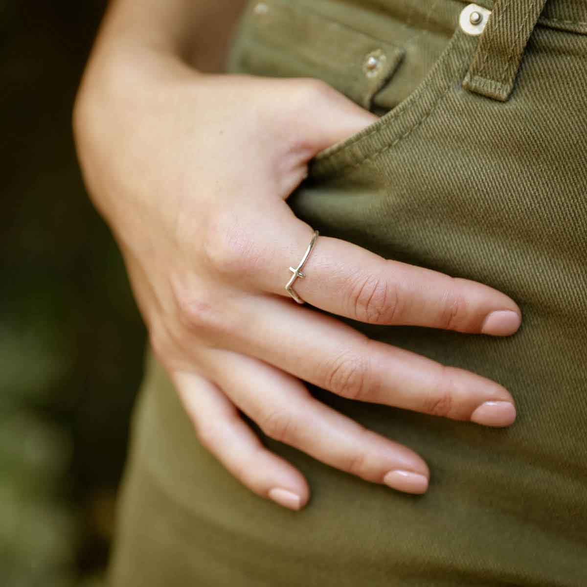 woman wearing a sterling silver At Every Turn Cross Ring