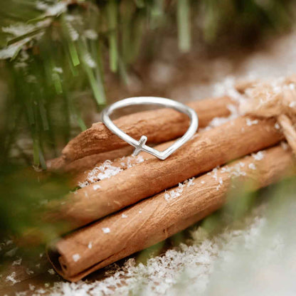 woman wearing a sterling silver At Every Turn Cross Ring