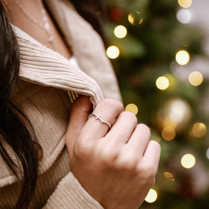 woman wearing a sterling silver At Every Turn Cross Ring