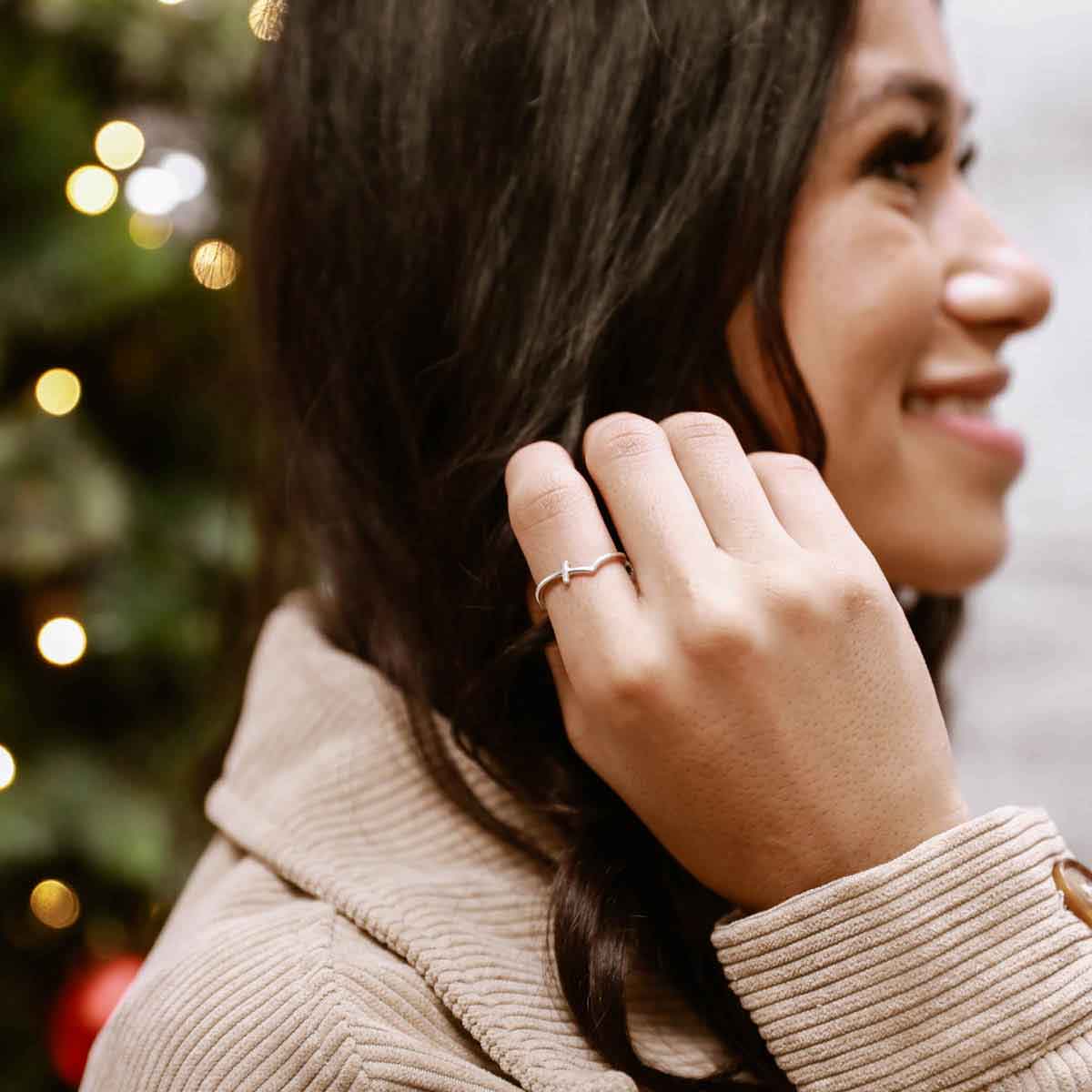 woman wearing a sterling silver At Every Turn Cross Ring