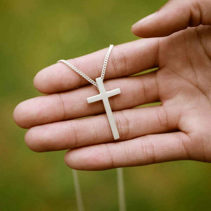 man wearing a sterling silver Beloved Cross necklace