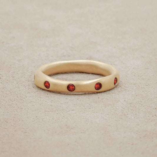 Stackable birthstone rings handcrafted in 10k yellow gold with 2mm birthstones