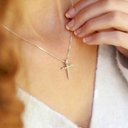 woman wearing a sterling silver Blooming Love Cross necklace