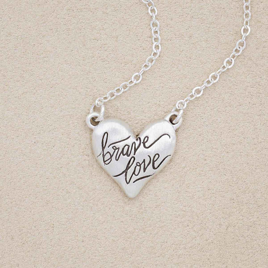Brave Love emblem necklace handcrafted in sterling silver with brave love message engraved