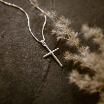 woman wearing a sterling silver Covenant of Love Cross necklace
