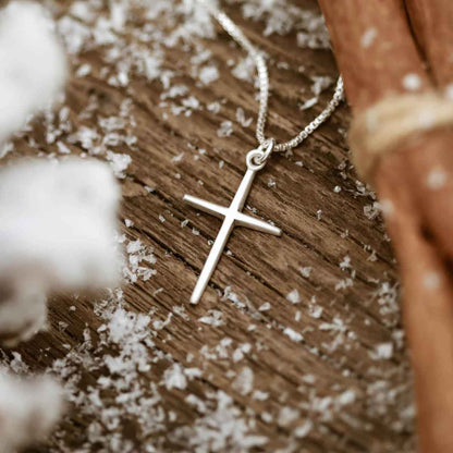 woman wearing a sterling silver Covenant of Love Cross necklace