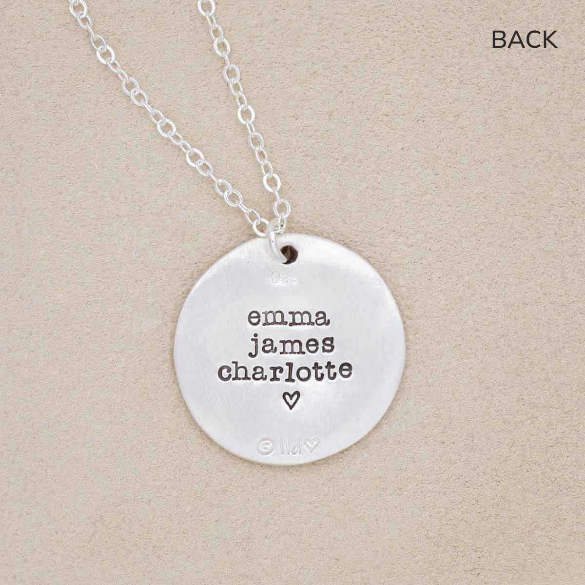 Family tree necklace handcrafted in sterling silver with a matte brushed finish and personalized with a quote or family name