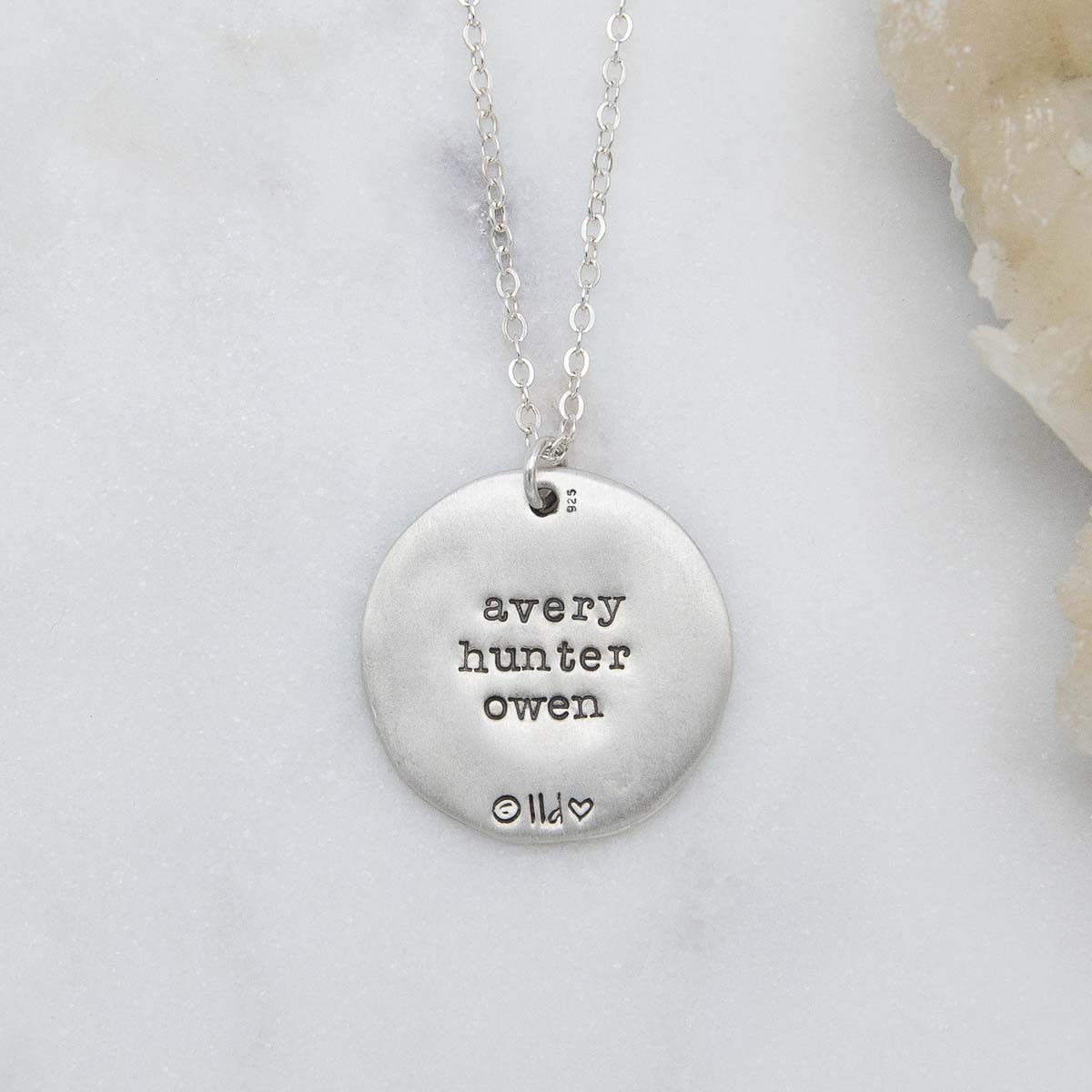 Family tree necklace handcrafted in sterling silver with a matte brushed finish and personalized with a quote or family name