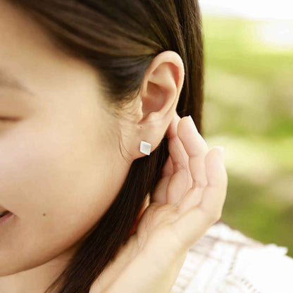 a pair of Fly A Kite Stud Earrings