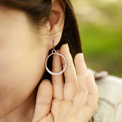 girl wearing pewter Hammered Hoop earrings