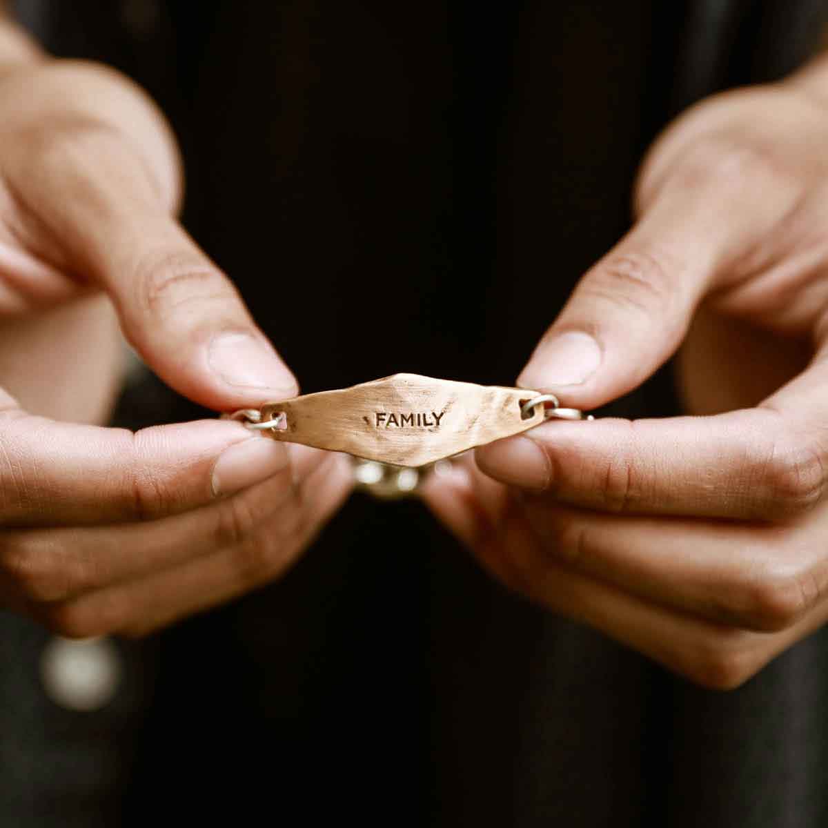 Identity Bracelet with a personalized Bronze metal plate and Sterling Silver chain