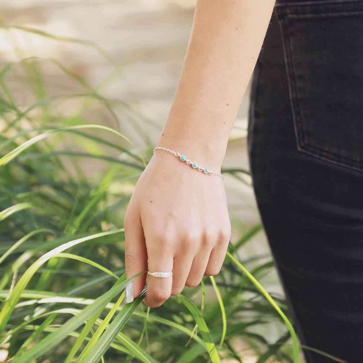 girl wearing sterling silver Lighthearted Turquoise Bracelet 