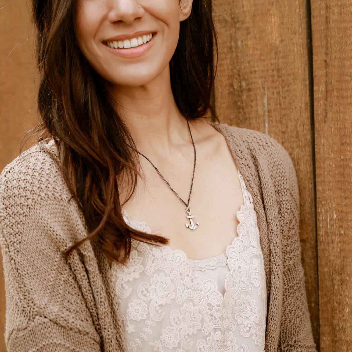 woman wearing Anchor of my Soul necklace handcrafted in antiqued sterling silver