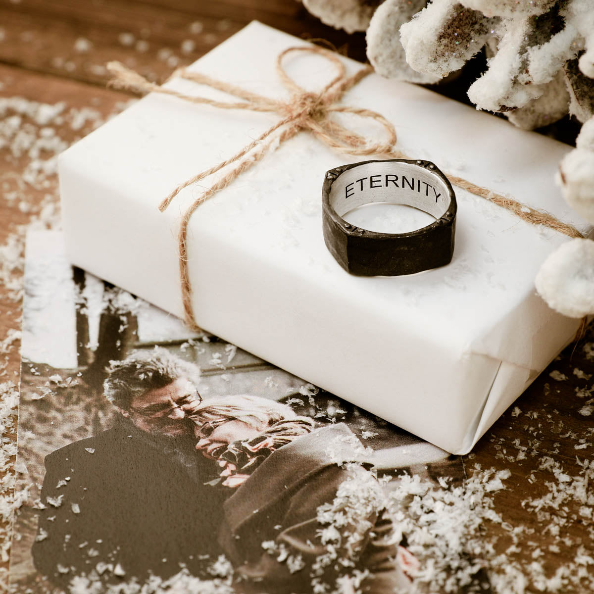 Man wearing Strong + True ring handcrafted in sterling silver and sandblasted to a matte black finish and personalized with a meaningful name