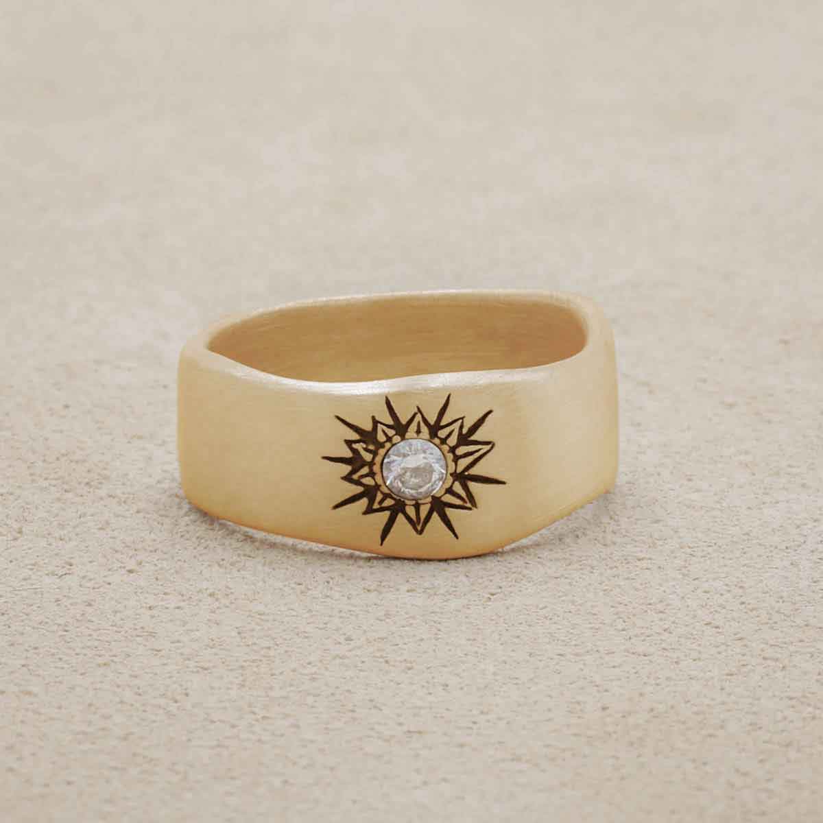 14k white gold sunburst diamond ring with a 3mm conflict free diamond