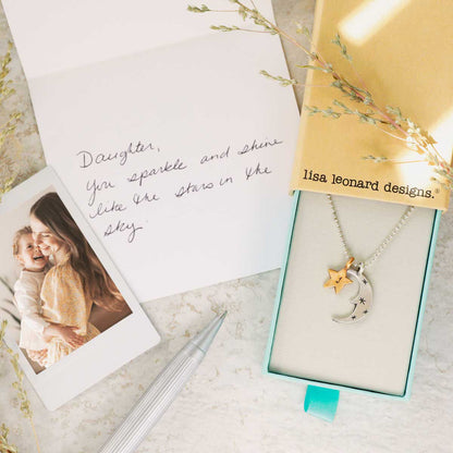Twinkle little stars necklace with sterling silver and bronze star and moon charms personalized with initials in original packaging