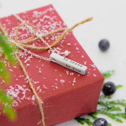 what matters most sterling silver necklace with 4 customizable sides and strung with a freshwater pearl